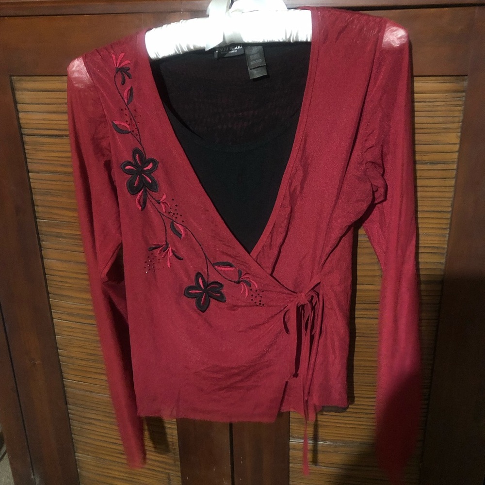 Red with black embroidery.